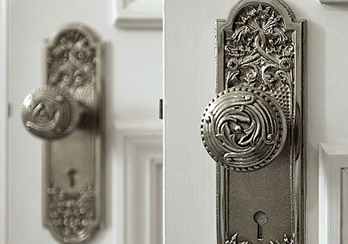 Decorative engraved silver doorknobs